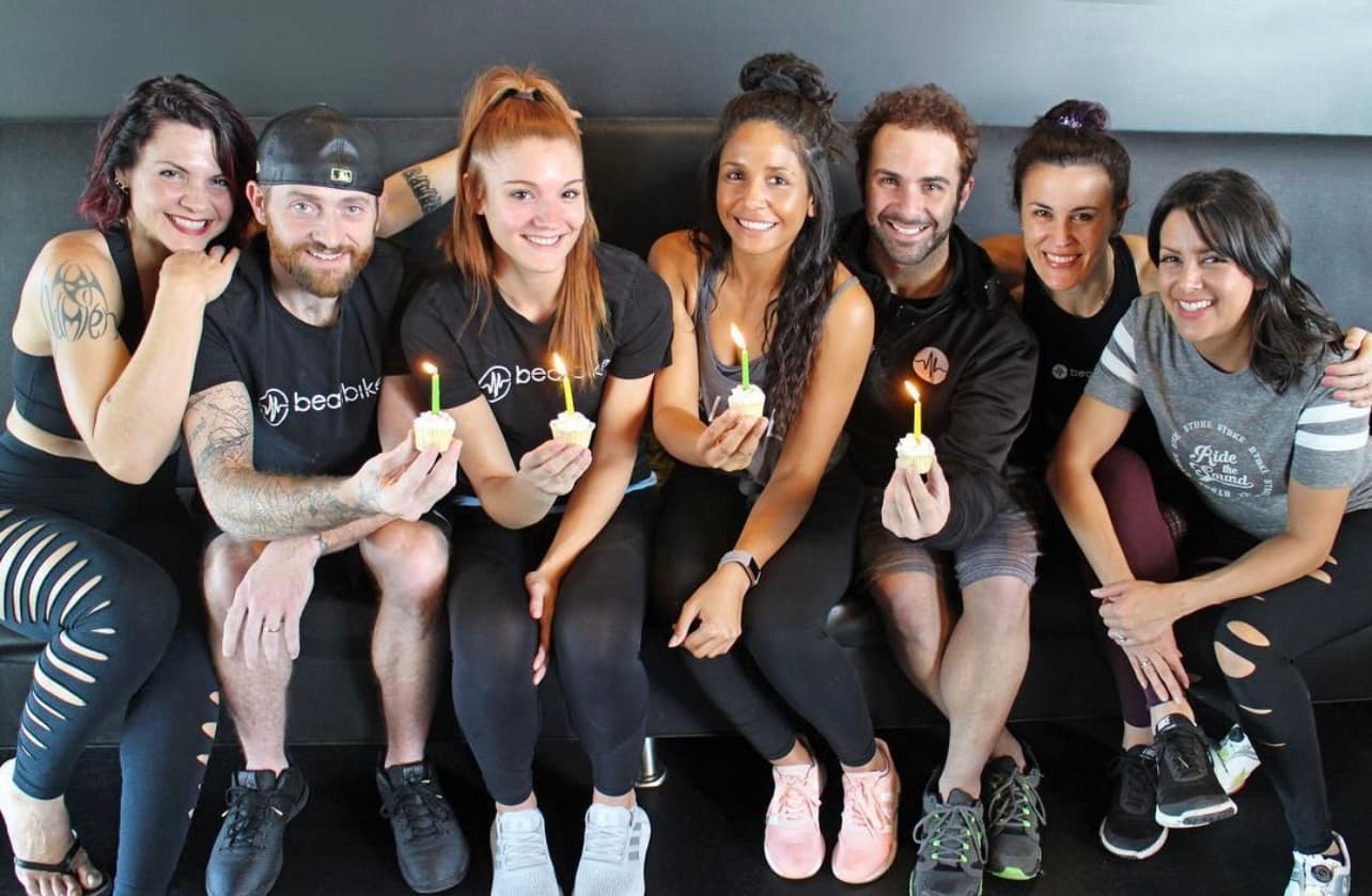 Beatbike community celebrating after class